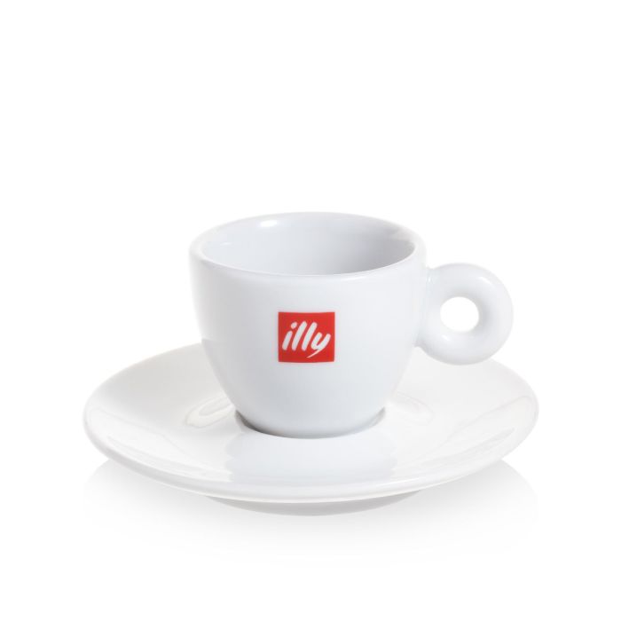 Composition Avec La Tasse De Café Et De Haricots D'Illy